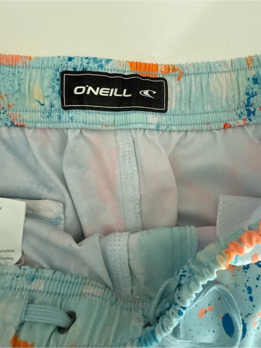 O'Neill Light Blue Swim Trunks 17” with Orange & Blue Splash Print